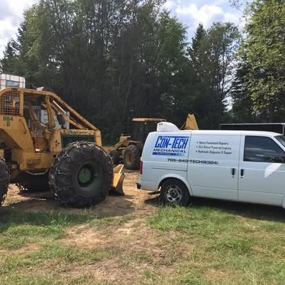 Backhoe loader and Con-Tech Mechanical service van